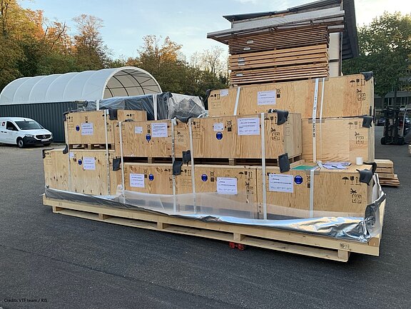 A pallet with the wooden crates in which the dismantled parts of the VTF are transported.